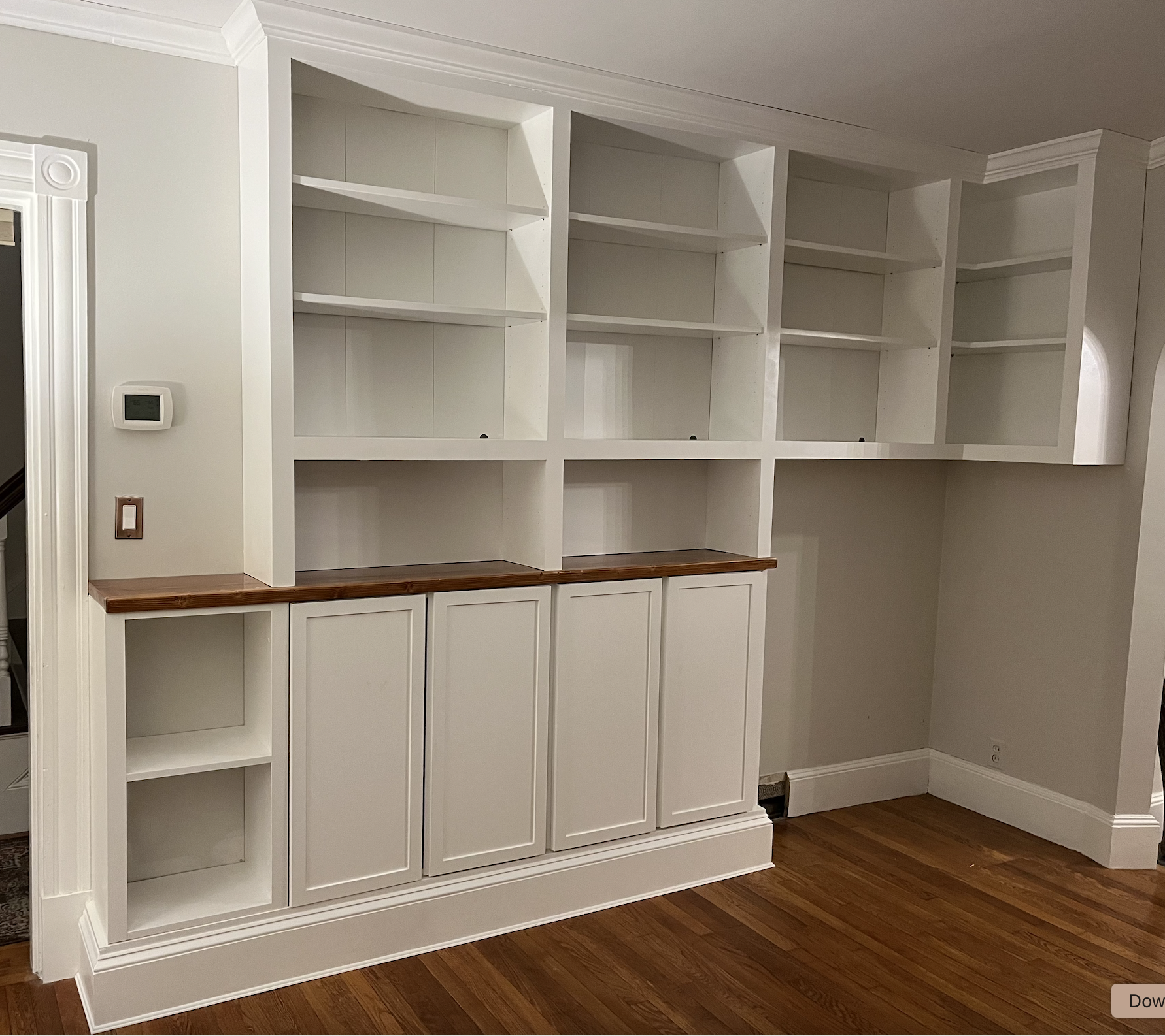 Custom floor-to-ceiling built-in shelving unit
